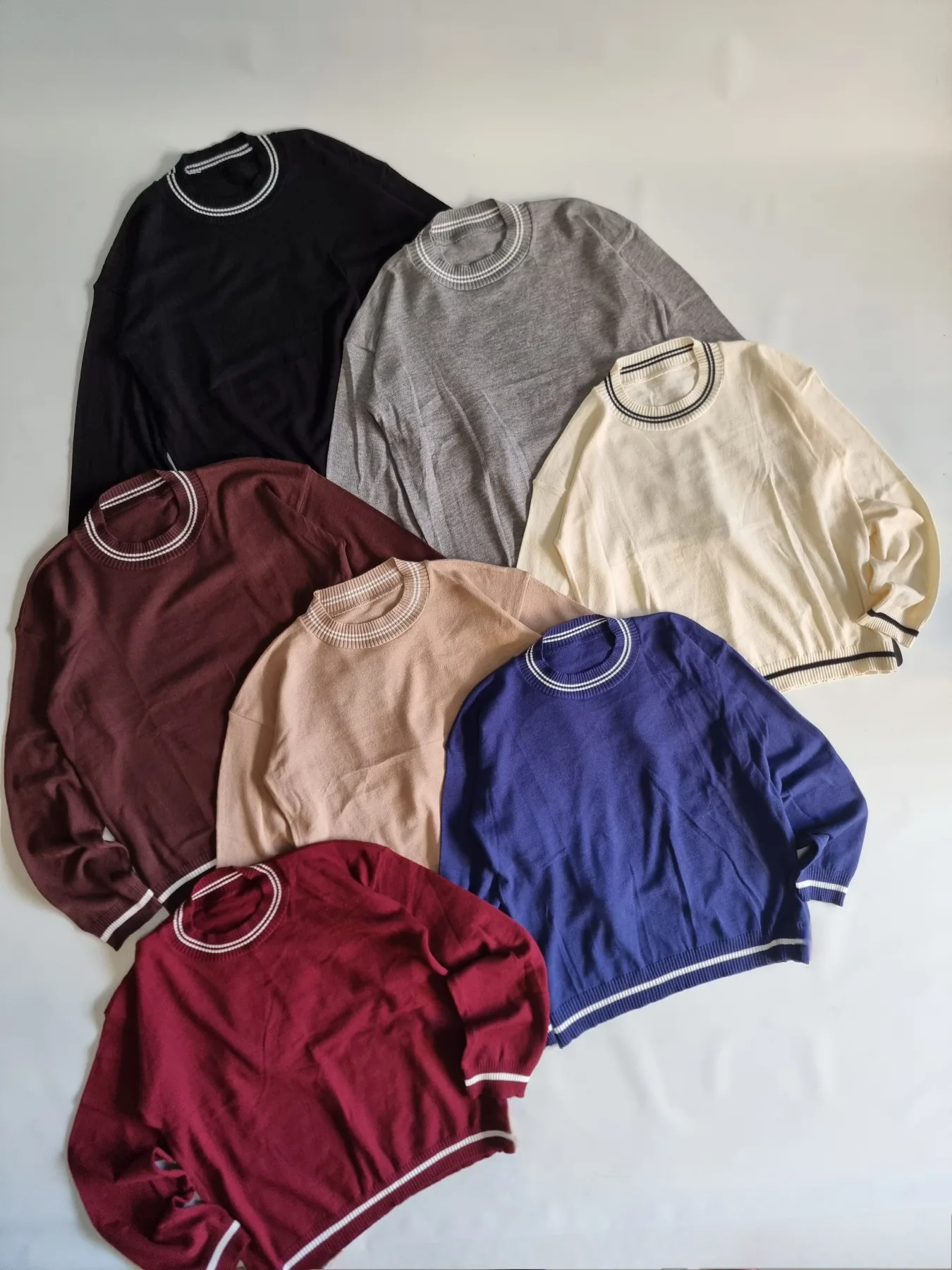 SWEATER CUELLO CON LA LINEA