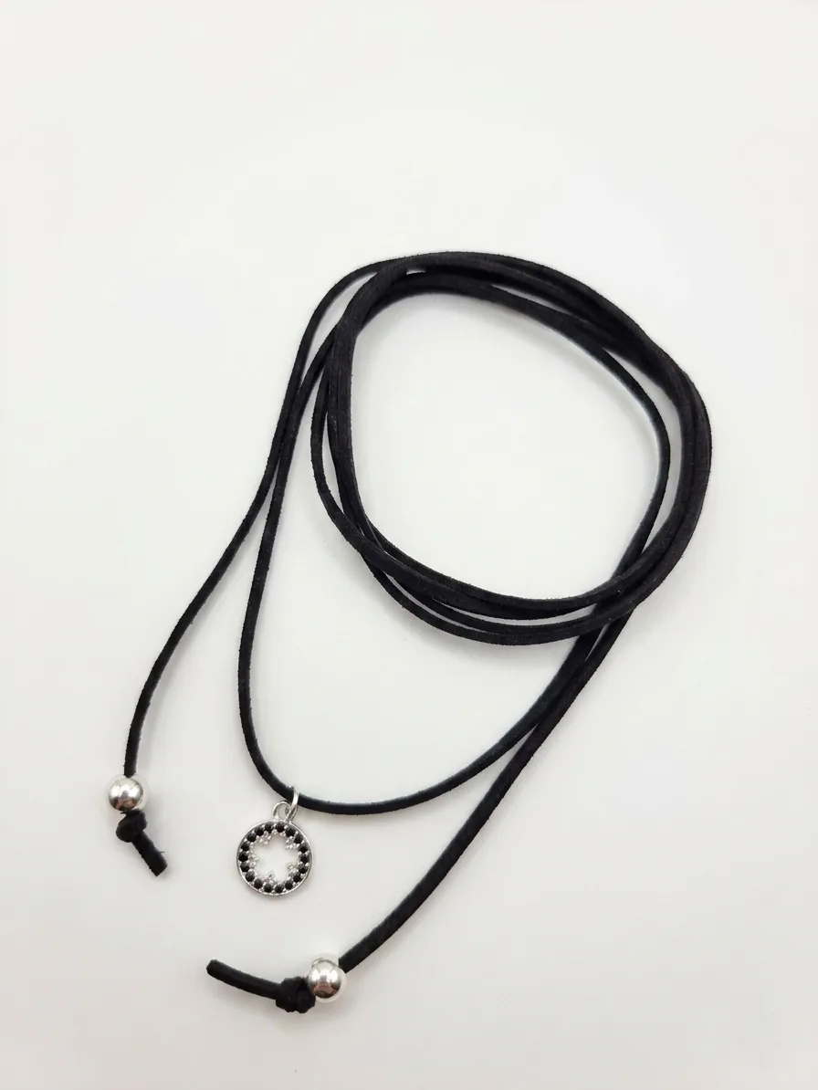 CHOKER CIRCULO NEGRO ADENTRO CON FLOR