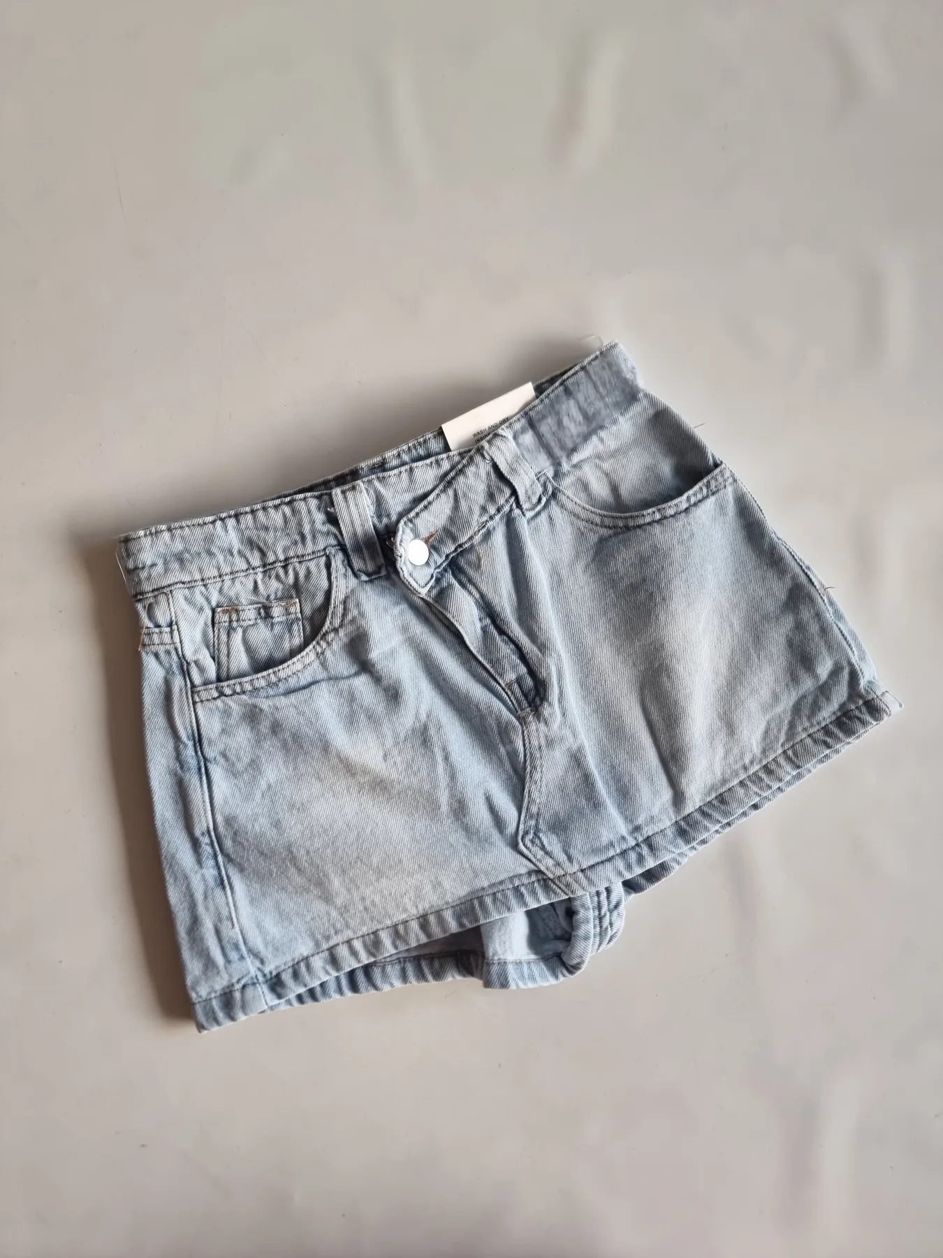 JEAN SHORT POLLERA CINTURA CRUZADO CELESTE